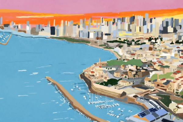 夕焼けと海沿いの街並み