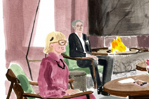 リビングルームで椅子に腰かける老夫婦